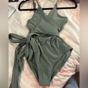 Never worn tags on Aerie sage green one piece adjustable swimsuit